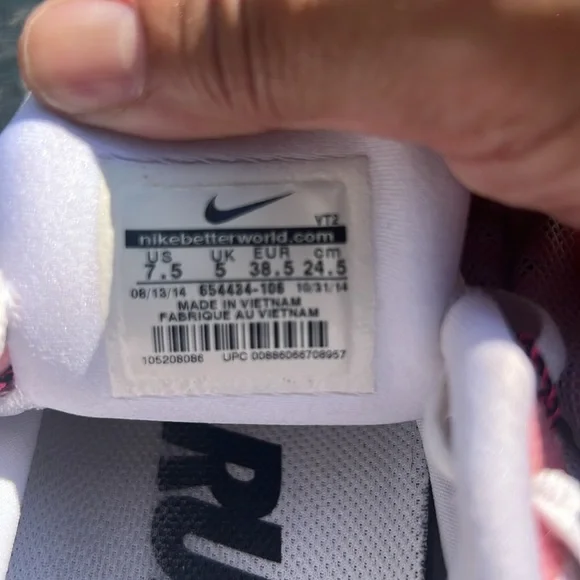 Nike Women's Pink, White and Black athletic sneakers. - Picture 17 of 17